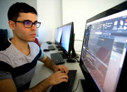 student working at a computer